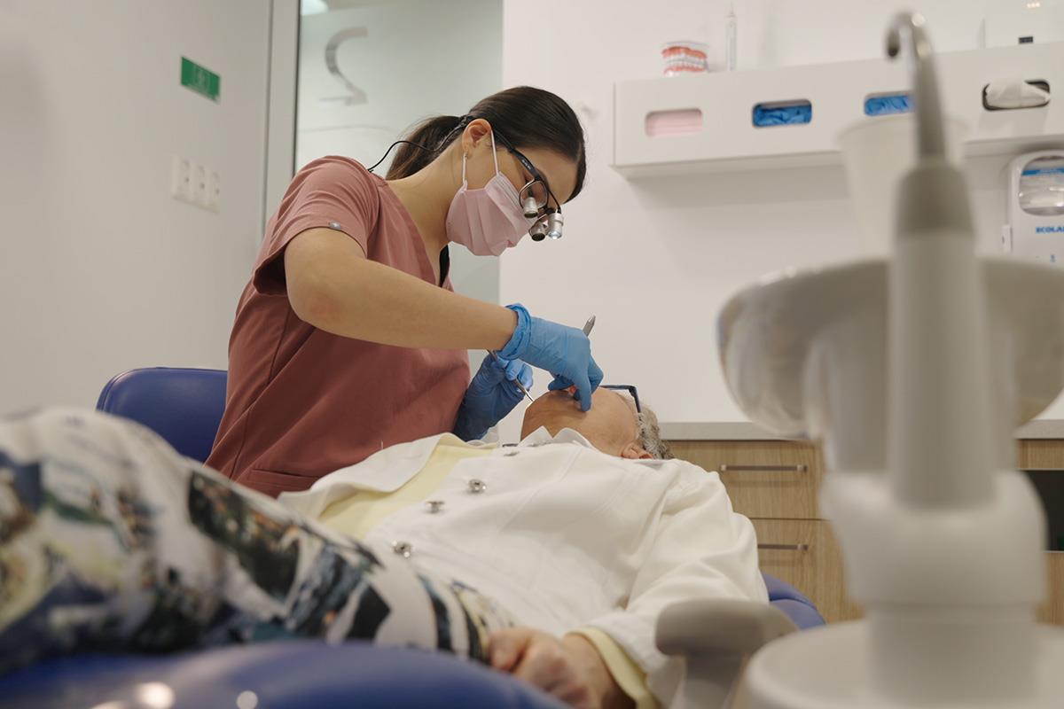 hygienist working on patient