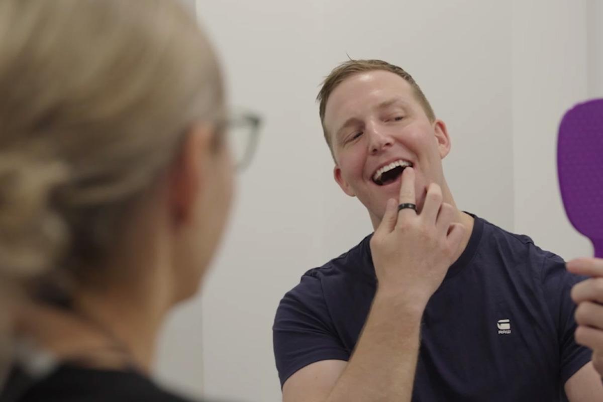 patient checking teeth