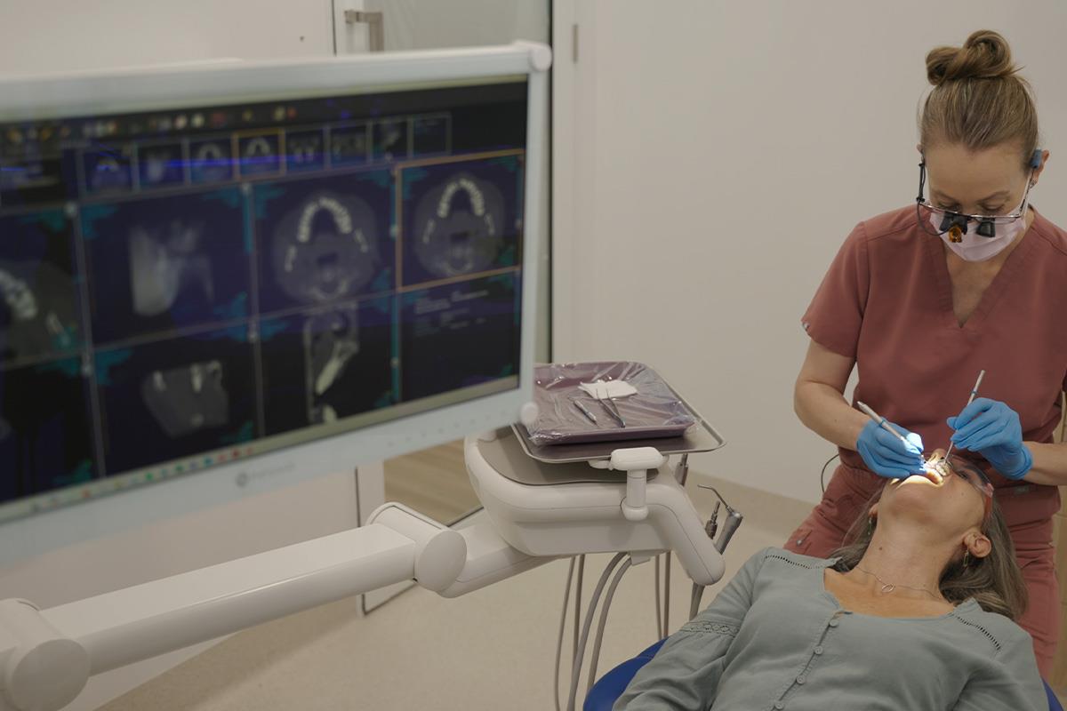 periodonist working on patient