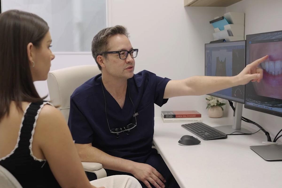 periodontist explaining scans