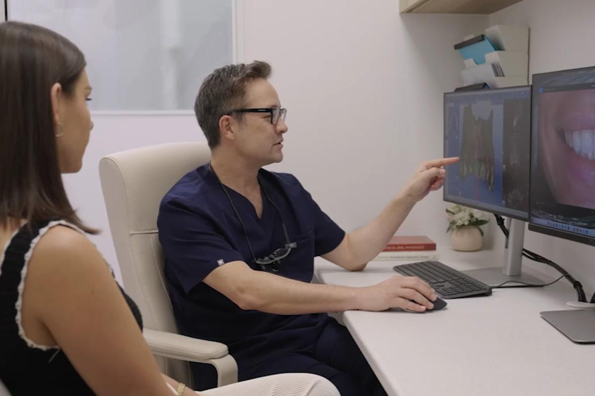 periodontist talking to patient